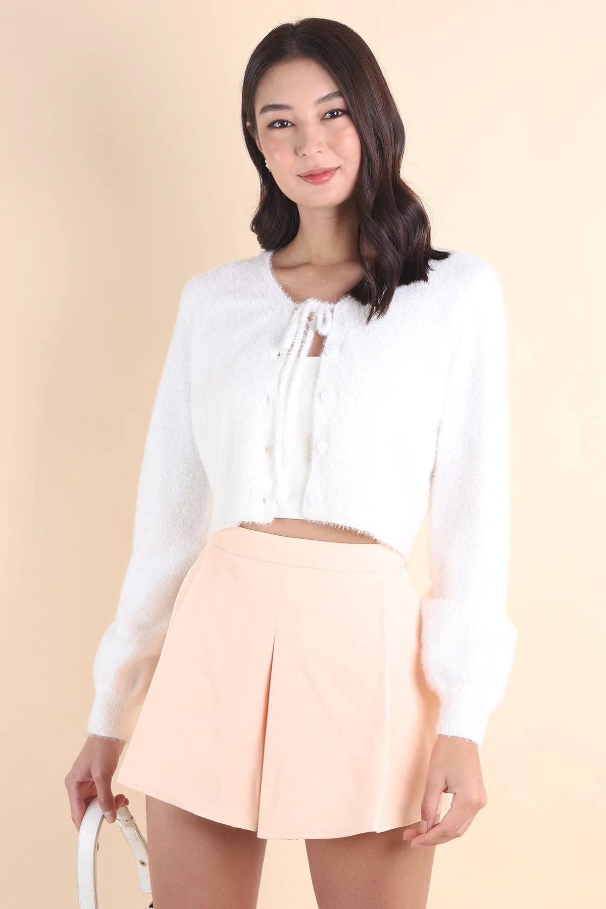 ELIZ BOW FURRY CARDIGAN IN WHITE