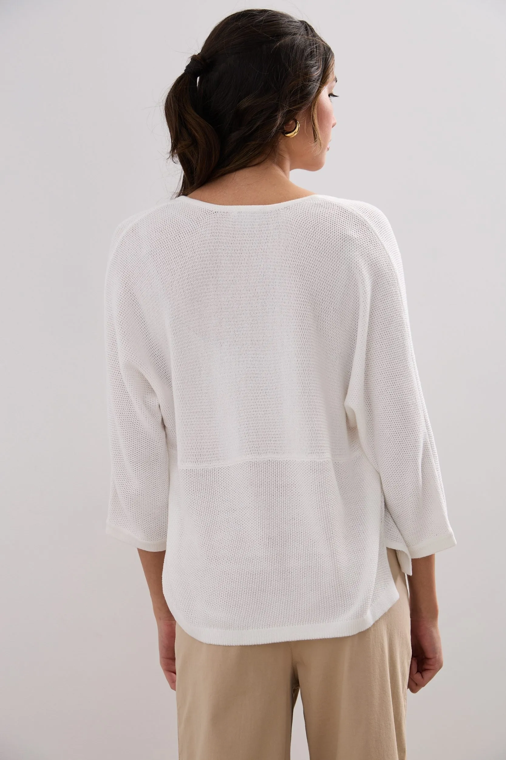 Open knit dolman sleeve sweater